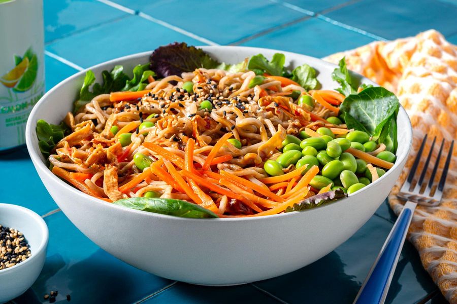 Sesame soba and yuba noodle bowl with edamame and pickled carrots
