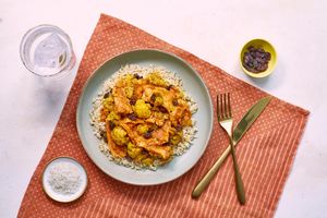 Salmon biryani with cauliflower, brown rice, and raisins