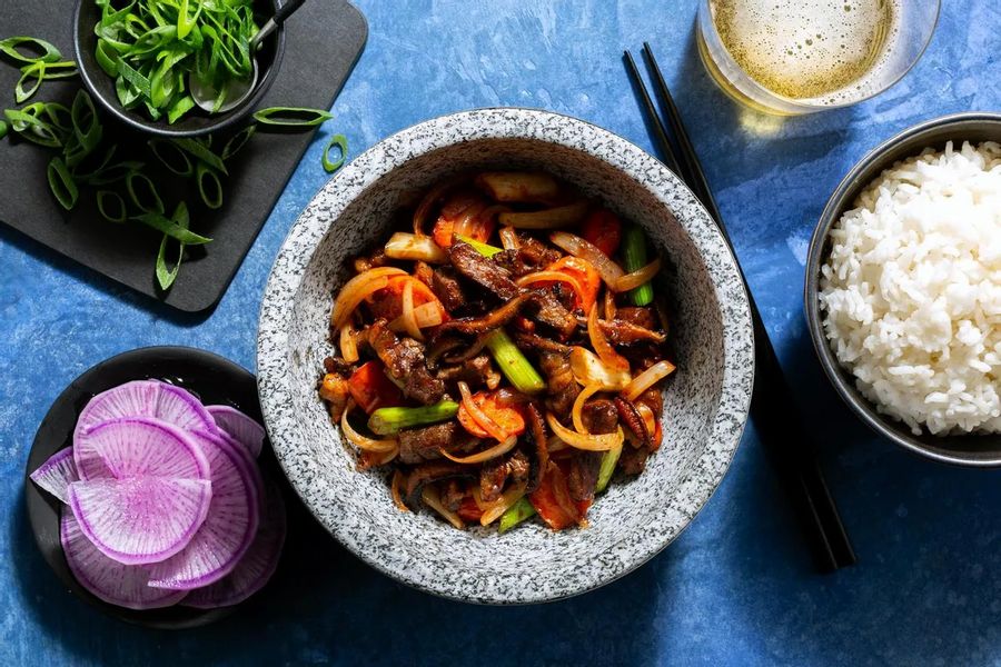 Korean spicy stir-fry with your choice of protein and pickled daikon