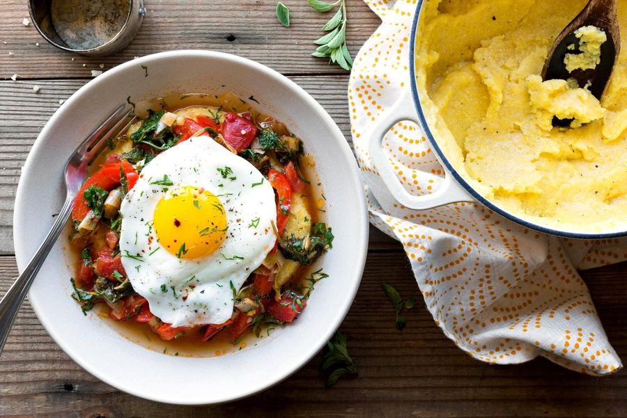 Soft-cooked polenta with red-pepper marinara sauce and eggs