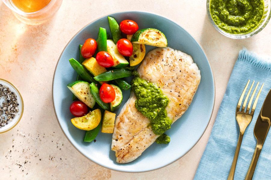 Seared salmon with chimichurri and Provençal vegetables