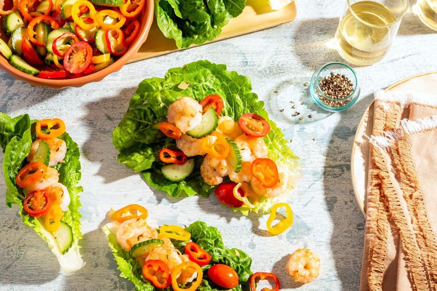Greek lettuce cups with sweet mini peppers, cucumber, and tomatoes