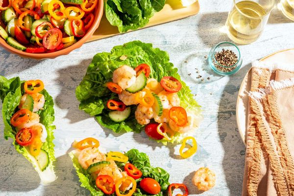 Greek lamb lettuce cups with sweet mini peppers, cucumber, and tomatoes