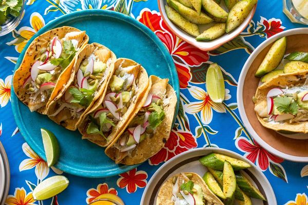 Fish tacos with avocado and Baja cucumber salad