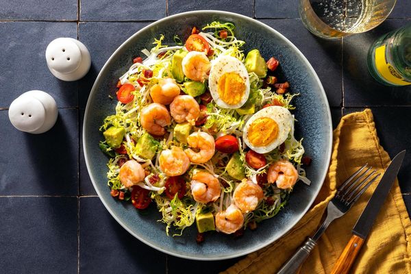 Frisée salad with pancetta, avocado, and soft-cooked eggs