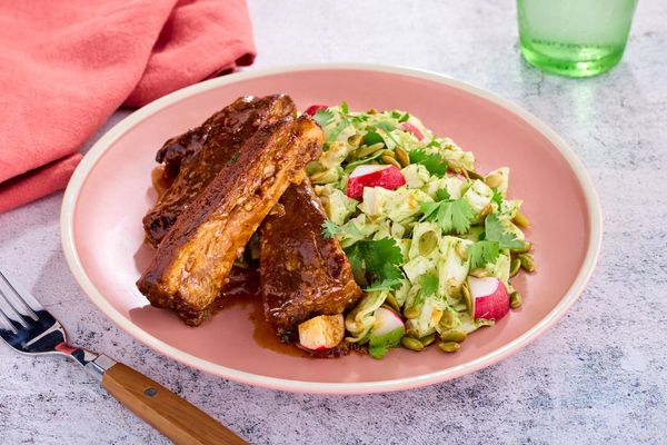 Orange-chipotle glazed ribs with green goddess chopped slaw