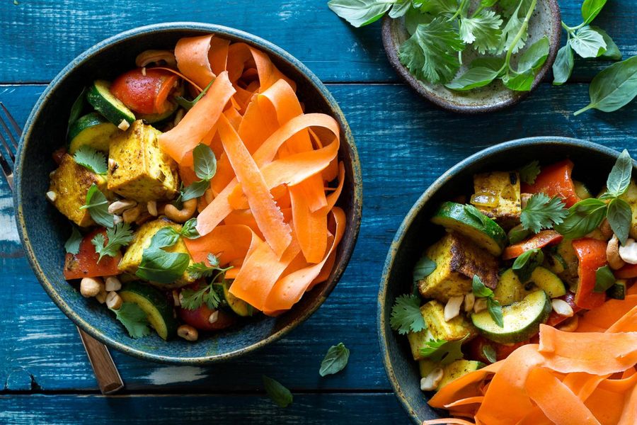 Curried tofu and summer squash with carrot ribbons