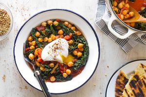 Chickpea and kale stew with poached eggs and za’atar