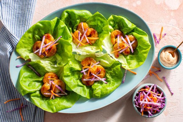 Hoisin steak strip lettuce cups with pickled daikon and carrots