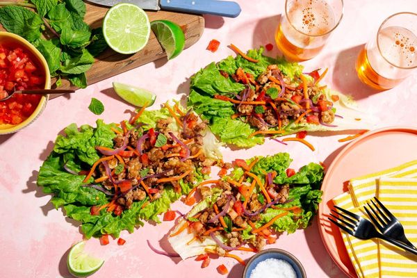 Chicken larb lettuce cups with carrots and fresh mint
