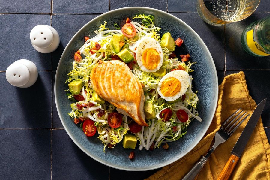 Frisée salad with pancetta, avocado, and optional additional protein