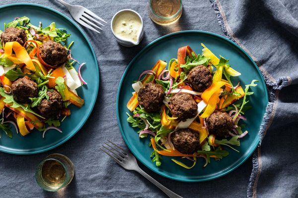 Chicken meatballs with caramelized onions and carrot-parsnip salad