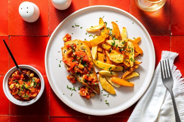 Roasted chicken and root vegetables with Catalan salbitxada sauce