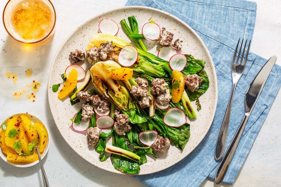 Your choice of protein with cashew-lime glaze, bok choy, and orange salsa