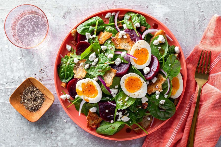 Beet and spinach panzanella with pita and pomegranate vinaigrette