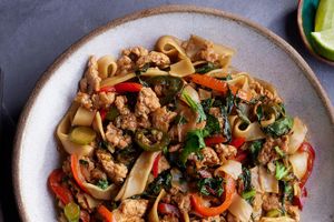 Pad kee mao–style pork and rice noodles with stir-fried vegetables