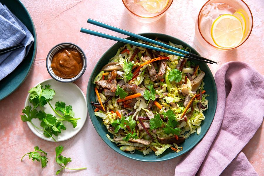 Mu shu bowls with shiitake mushrooms, cabbage, and hoisin sauce