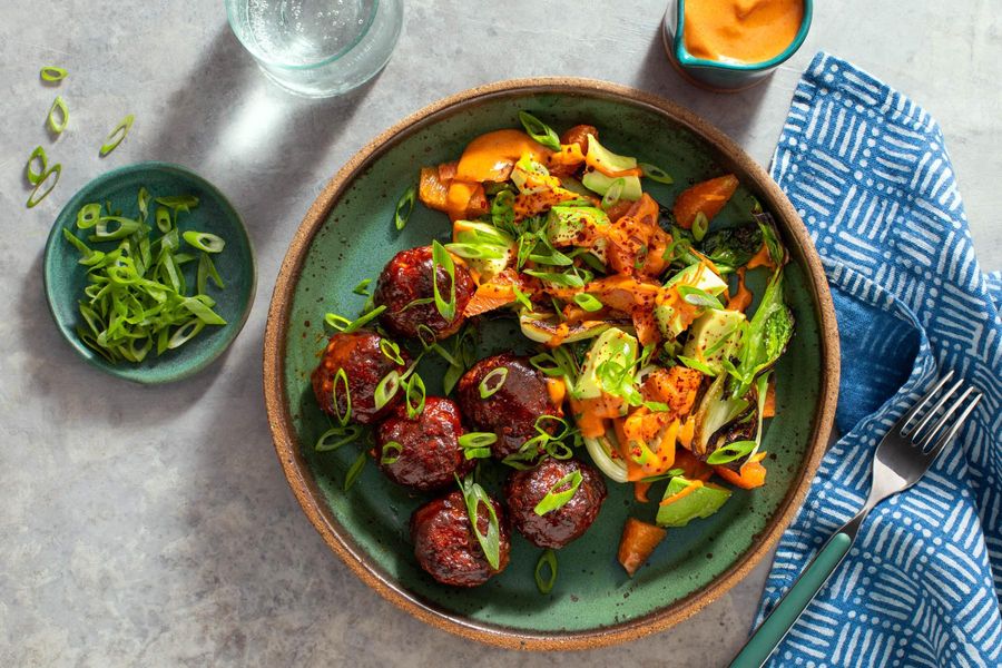 Korean BBQ meatballs with baby bok choy and avocado-orange salad