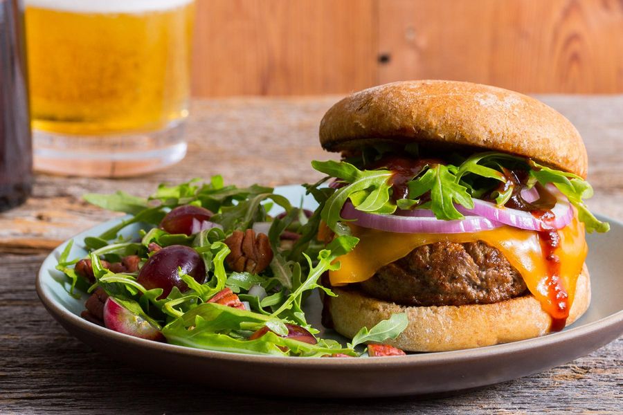 Memphis BBQ cheeseburgers with grape, pecan, and arugula salad image