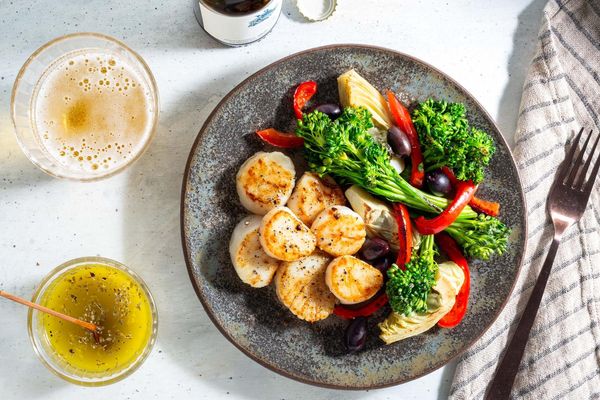 Mediterranean lemon chicken with baby broccoli, artichokes, and olives