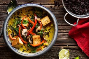 Golden coconut curry with tofu, spinach, and black rice