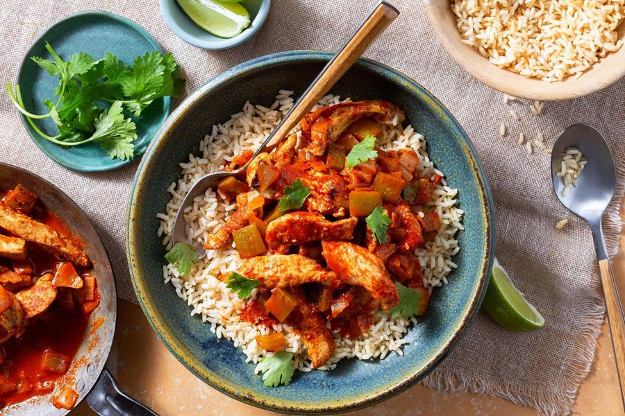 Ecuadorian chicken stew with bell pepper and brown rice