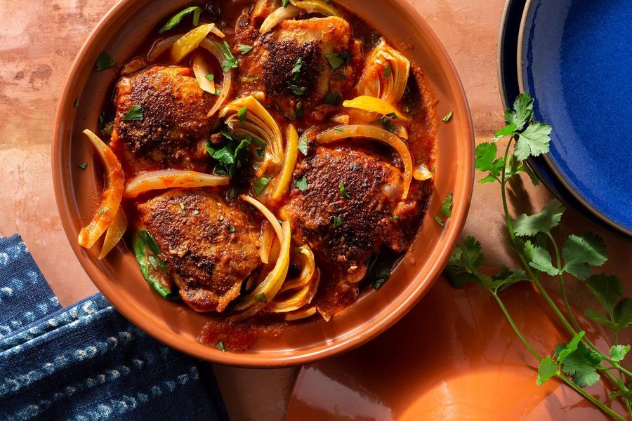 Chicken tagine with currants, spinach, and artichokes