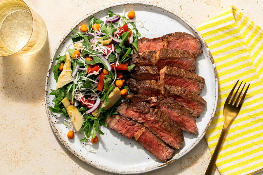 Black Angus steaks with chickpea, artichoke, and roasted red pepper salad
