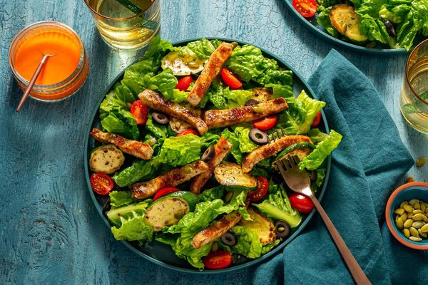 Steak and zucchini salad with olives and red pepper vinaigrette