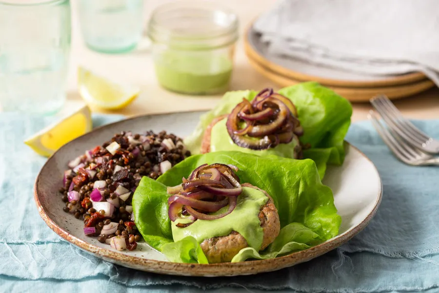 Lettuce-wrapped turkey burgers with green goddess dressing and lentil salad