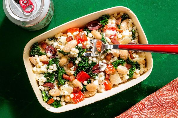 Pancetta and kale couscous with olives and creamy feta dressing