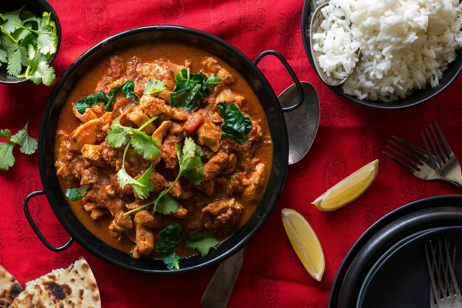 Chicken tikka masala with basmati rice and naan