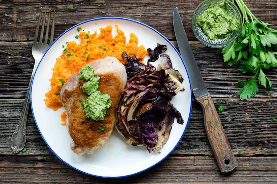 Seared boneless pork chops with chermoula butter