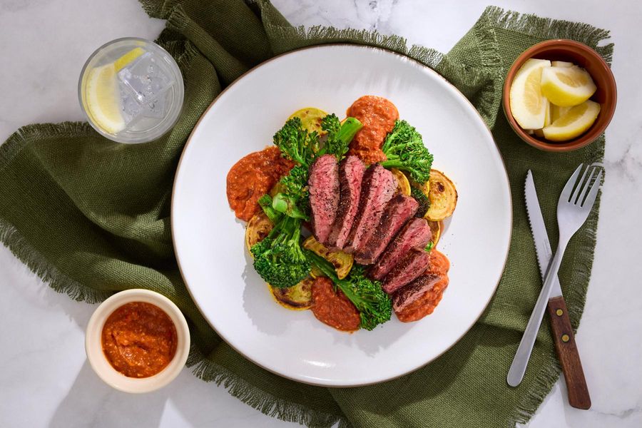 Your choice of protein with romesco, vegetables, and almonds