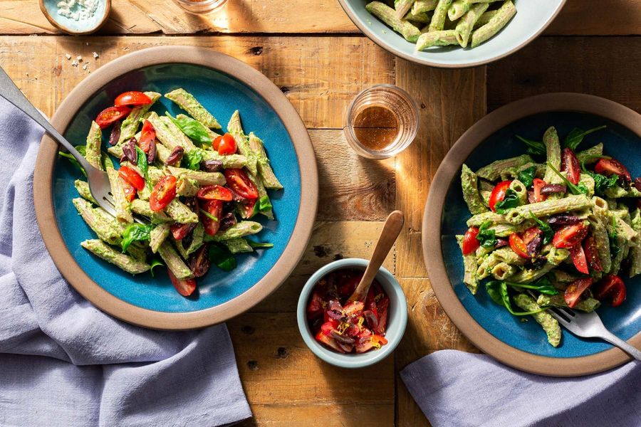 Fresh penne with spinach, ricotta, and tomato-olive tapenade