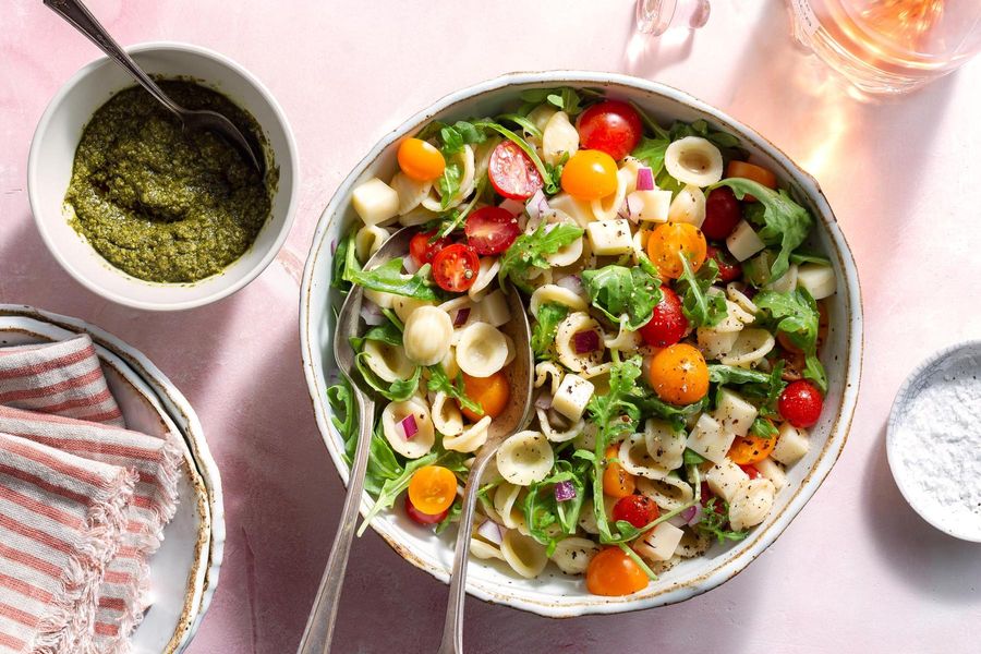 Caprese orecchiette with cherry tomatoes and basil pesto