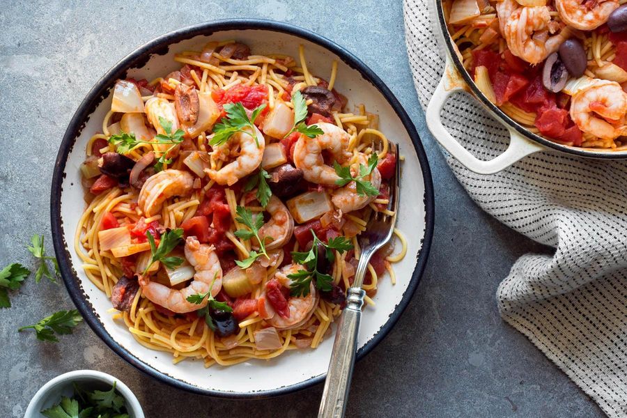 Spaghetti with shrimp, fennel, tomatoes, and olives