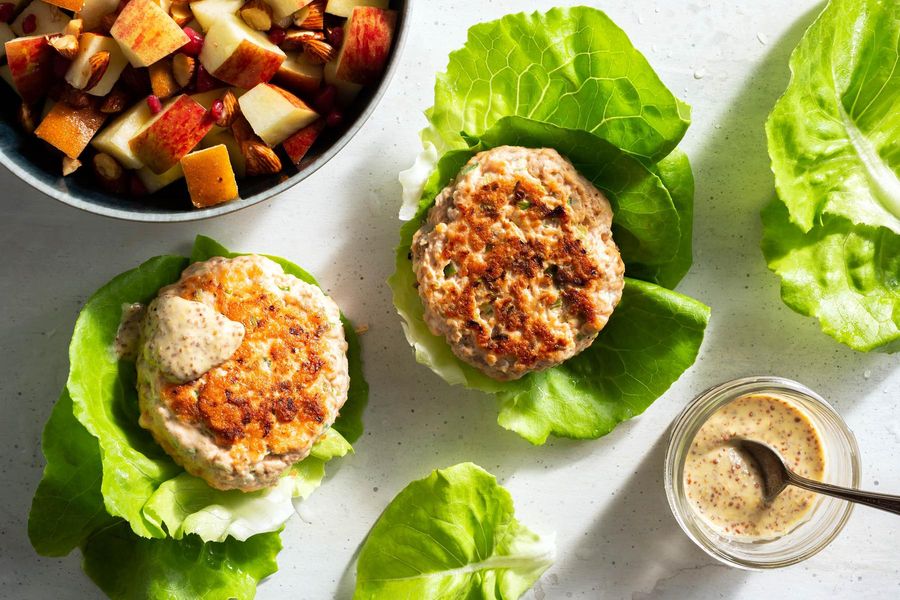 Lettuce-wrapped salmon burgers with fall fruit salad