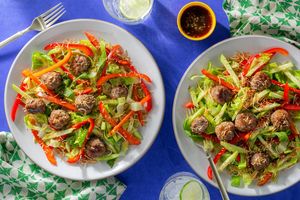 Coconut-lime meatballs with Thai cucumber and bell pepper salad