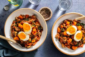 Italian sausage and vegetables in marinara with soft-cooked eggs