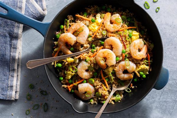 Pork fried cauliflower “rice” with carrots, peas, and scallions