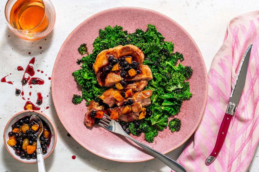 Blueberry-apricot sauce over your choice of protein and sautéed kale