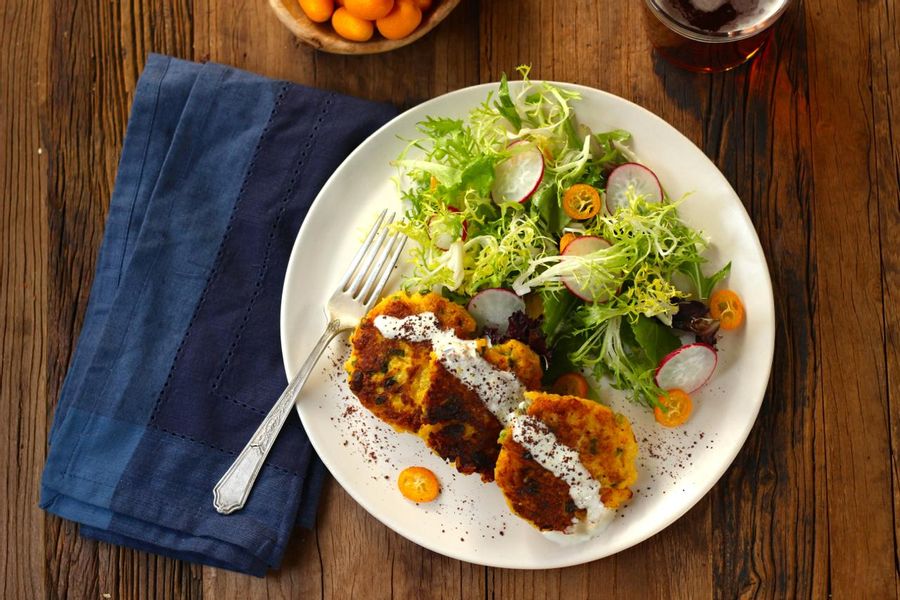 Cauliflower fritters with lemon yogurt and tangy mixed green salad