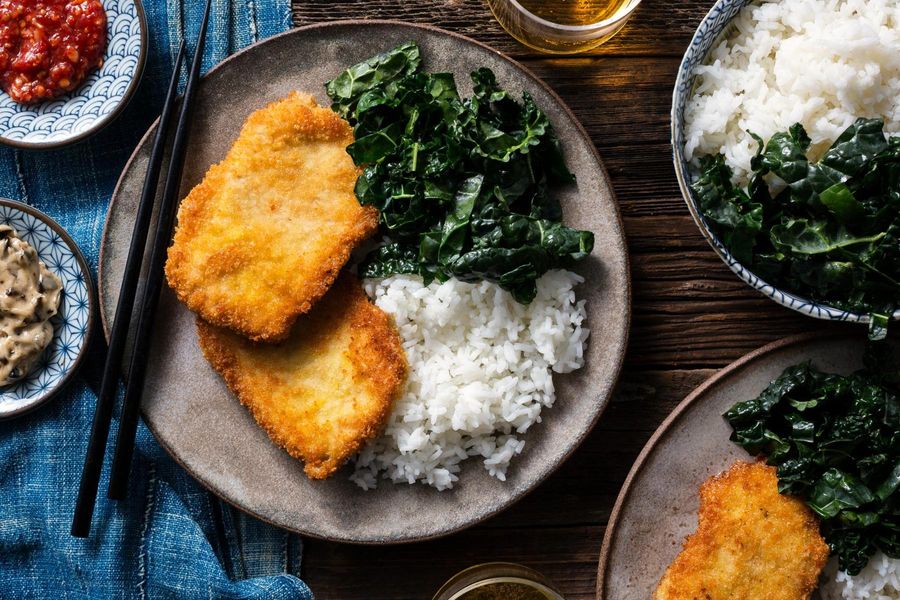 Pork katsu with black garlic mayo, wilted greens, and jasmine rice