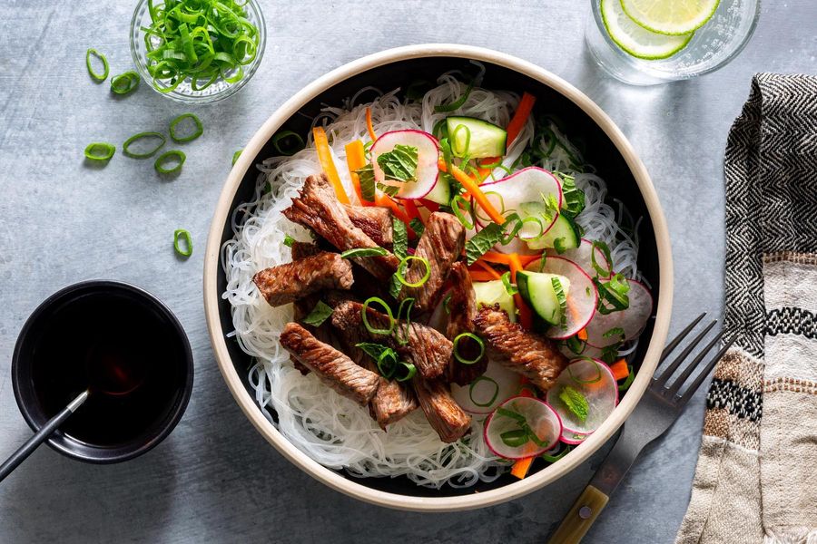 Saigon noodle bowls with braised tofu and cucumber-radish salad