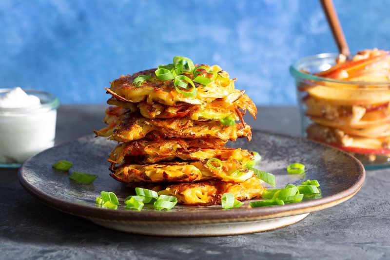 Root Vegetable Latkes with AppleWalnut Salad and Horseradish Yogurt