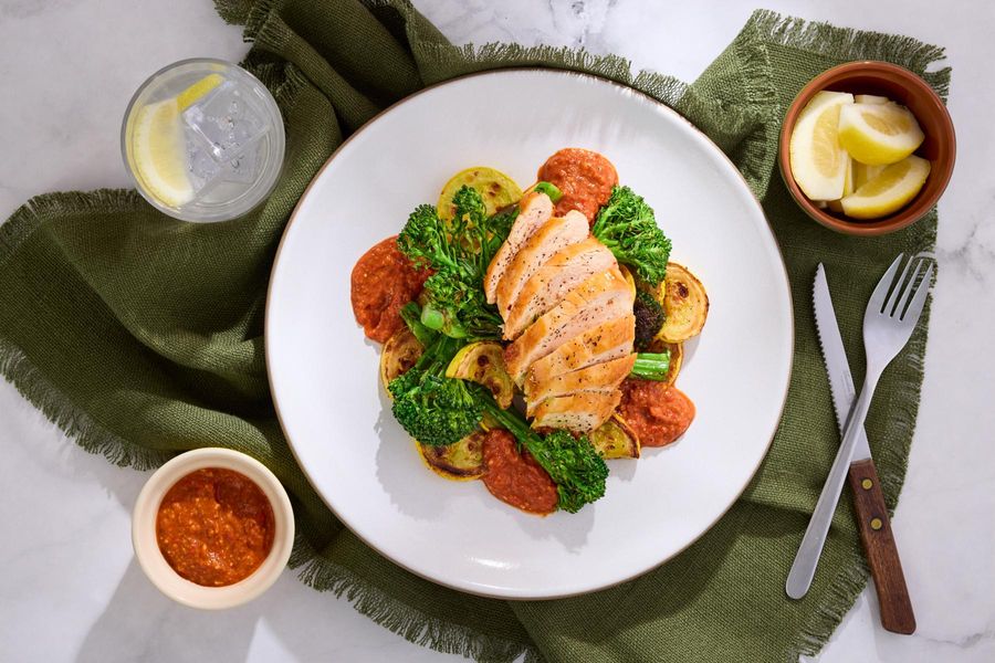 Your choice of protein with romesco, vegetables, and almonds