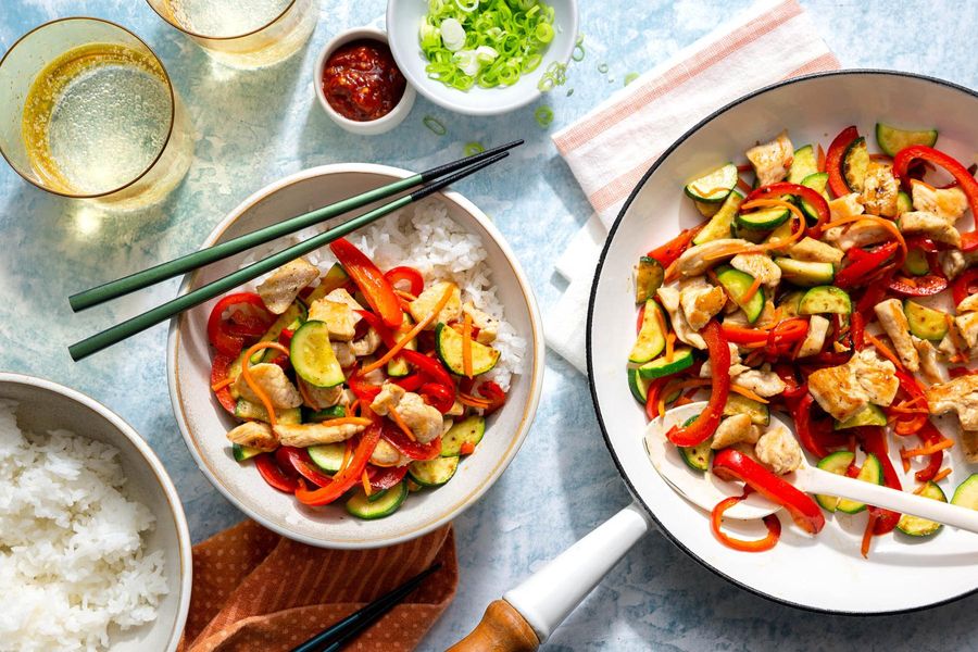 Hanoi stir-fry with zucchini and bell pepper over steamed rice