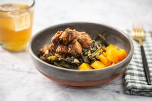 Maple chicken over braised greens