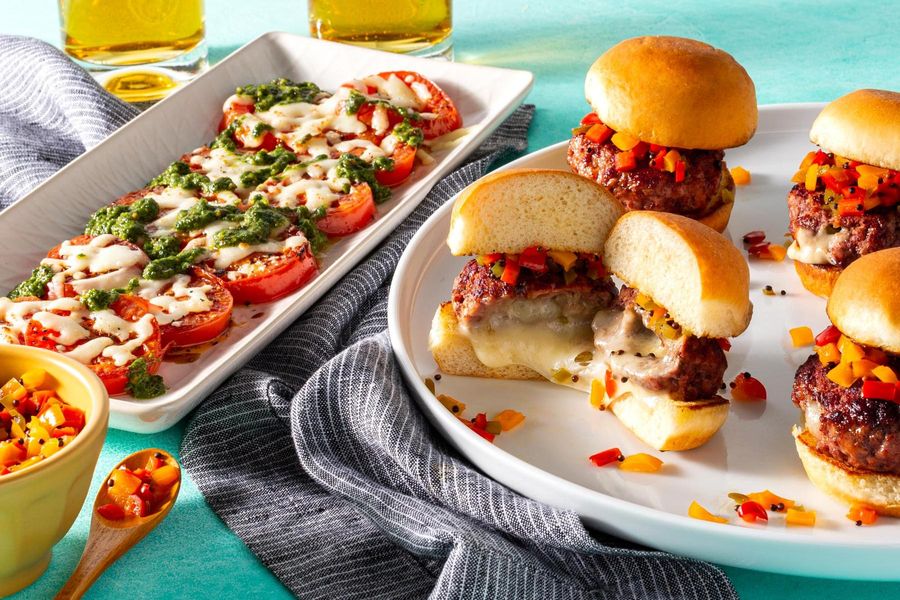 Juicy Lucy sliders with peperonata relish and warm caprese salad
